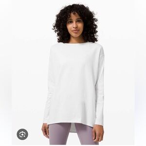 Lululemon back in action relaxed Long Sleeve Metallic Striped White Top tech